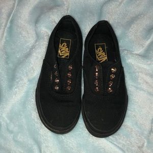 Vans with gold spikes
